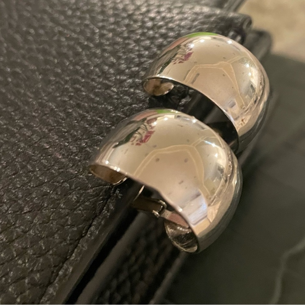 Vintage chrome Trifari clip on hoops